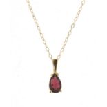 9ct gold garnet tear drop pendant on a 9ct gold necklace, 48cm in length, 1.1g : For Further