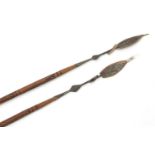 Two Masai warrior spears with steel heads, 105cm in length : For Further Condition Reports, Please