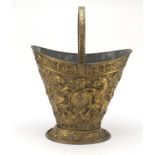 Victorian copper coal scuttle embossed with a coat of arms, 52cm high : For Further Condition