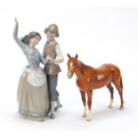 Lladro figure group of a dancing boy and girl and a Beswick tan horse, the largest 30cm high : For