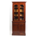 Victorian mahogany library bookcase fitted with a pair of glazed doors enclosing adjustable shelves,