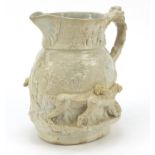 Mason's ironstone jug, decorated in relief with figures in a tavern and dogs, 22.5cm high : For