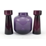 Whitefriars amethyst glass vase and a similar pair, the largest 20.5cm high : For Further