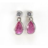 Pair of 18ct gold diamond and ruby tear drop stud earrings, 1.1cm in length, 1.6g : For Further