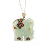 Chinese jadeite and enamel elephant pendant, 3.5cm in length, on a 9ct gold necklace, 44cm in