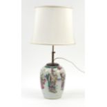 Chinese porcelain jar table lamp with silk lined shade hand painted in the famille rose palette with