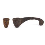 Tribal carved wood Turkana ladle and a stitched animal skin beaker, the ladle 43cm in length : For