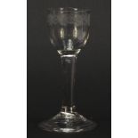18th century wine glass with engraved bowl and folded foot, 14cm high : For Further Condition