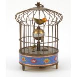 Novelty brass and enamel clockwork automaton birdcage clock, 19cm high : For Further Condition