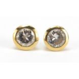 Pair of 9ct gold clear stone stud earrings, 1cm in diameter, 4.2g : For Further Condition Reports,