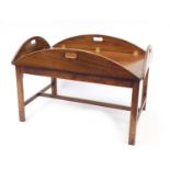 Mahogany butler's tray on stand with brass mounts and Nordiska Kompaniet plaque, 63cm H x 93cm W x