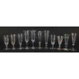 Eleven 18th/19th century Champagne flutes including two with blade collars and knopped stems and a