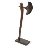 South African tribal interest ceremonial wooden axe, on later display stand, 49cm in length : For