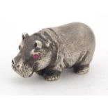 Silver model of a hippopotamus with glass eyes, Russian marks to the base, 3.5cm in length, 52.