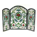 Leaded stained glass three fold screen with Art Nouveau floral roundels, 72cm high x 51cm wide