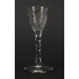 18th century wine glass with engraved bowl and facetted stem, 14.5cm high : For Further Condition