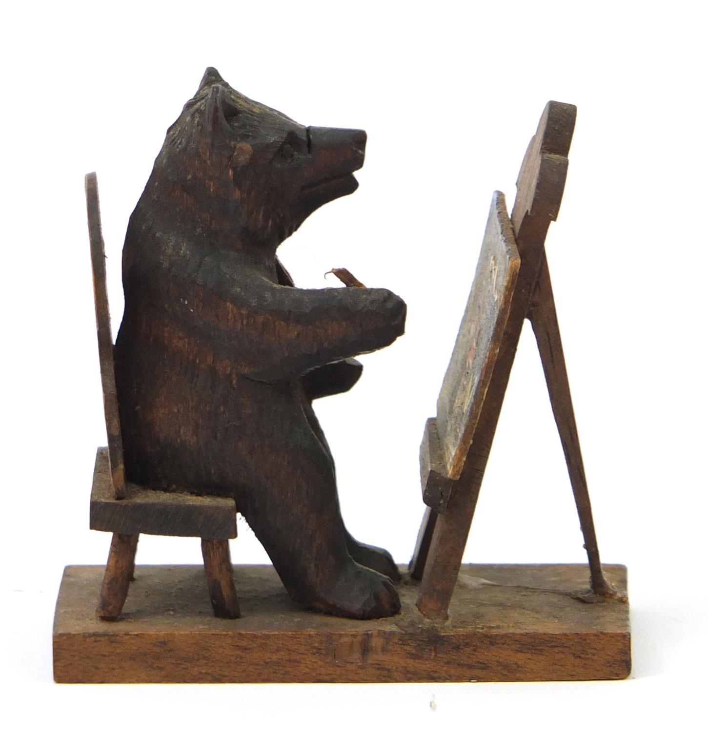 Novelty miniature Black Forest carved wooden bear sat at an easel, 6cm high : For Further - Image 5 of 9