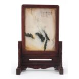 Chinese hardstone table screen carved with calligraphy, house in a hardwood stand, 29cm high x