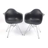 Pair of Vitra chairs designed by Charles Eames, each 81.5cm high : For Further Condition Reports,