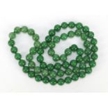 Chinese green jade bead necklace, 82cm in length : For Further Condition Reports, Please Visit Our