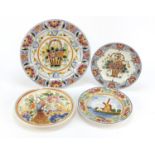 Four Delft hand painted plates, the largest 33cm in diameter : For Further Condition Reports, Please