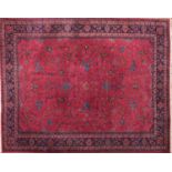 Persian Sarouk carpet with vines and flowers onto a red and blue ground, 360cm X 267cm : For Further