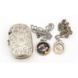 Late Victorian silver vesta case with scroll decoration, Chester 1898 together with a silver