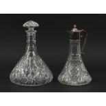 Large cut glass ship's decanter and a claret jug with silver plated mounts, the largest 34cm