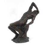 Large Modernist patinated bronze sculpture of a nude male on a rock, 66cm high : For Further