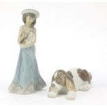 Lladro puppy and figurine of a girl holding a puppy, numbered 5645, the largest 20cm high : For