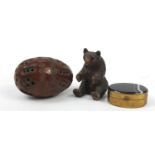 Objects comprising Black forest bear, brass patch box with agate lid an a carved wood egg, the