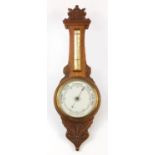 Carved oak wall aneroid barometer with thermometer, 84cm high : For Further Condition Reports,