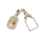 Sterling silver and 18ct gold keyring, 1.8cm in length, 17.2g : For Further Condition Reports,