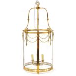 French Empire style gilt metal lantern with glass panels, 84cm high : For Further Condition Reports,