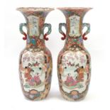 Large pair of Japanese Arita porcelain floor standing vases with twin handles, each finely hand