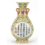 Chinese porcelain vase wall pocket hand painted with calligraphy within a famille rose floral border