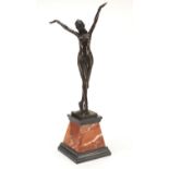 Large patinated bronze of a scantily dressed Art Deco dancer after Demetre Chiparus raised on a