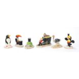 Six Carlton ware Guinness advertising figures and animals including toucan, tortoise and ostrich,
