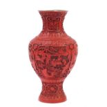 Chinese cinnabar lacquer baluster vase carved with panels of figures in garden landscapes, 48cm :
