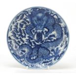 Chinese blue and white porcelain plate hand painted with a dragon, four figure character marks to