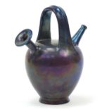 Early 20th century Zsolney Pecs pottery twin spouted ewer, painted impressed marks to the base, 19.