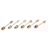 set of six Malaysian silver coloured metal teaspoons housed in a fitted case, 11cm in length, 43.