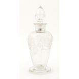 19th century glass and silver collared wine communion wine bottle, etched floral decoration,