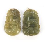 Pair of Chinese jade pendants with gold suspension loops, each carved with mythical animals, each