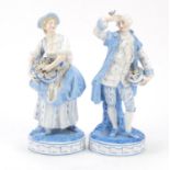 Pair of 19th century Continental porcelain figures of the flower sellers, the largest 27cm high :