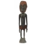 Large Sepik River tribal carved wood female ancestor figure from Papua New Guinea, inlaid with