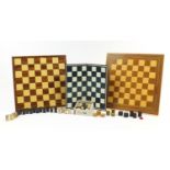 Vintage games comprising three wooden chess boards, bone and ebony dominoes and draughts : For