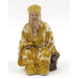 Chinese porcelain figure of a seated Elder holding a scroll, 29cm high : For Further Condition