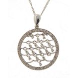 9ct white gold diamond pendant, 2.5cm in diameter, on a 9ct white gold necklace, 5.6g : For