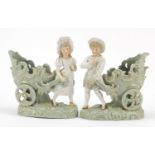 19th century French bisque porcelain vases of children pulling sleighs, each 25cm high : For Further